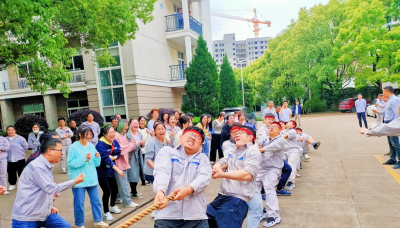 迎亚运、庆“五一”mansion88明升职工拔河比赛